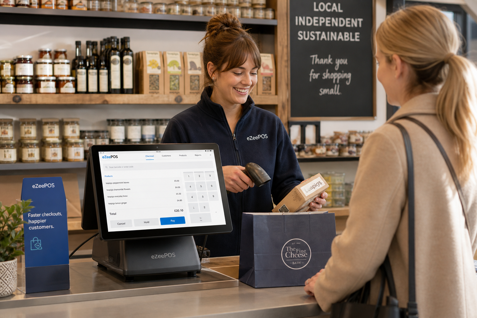 Barcode Scanning for Faster Retail Checkouts, photorealistic commercial photography style image of a busy UK independent retail shop counter with a modern eZeePOS-style touchscreen POS terminal, handheld barcode scanner in use, neatly arranged products, and a friendly staff member serving a customer while keeping the queue moving, warm natural lighting, shallow depth of field, clean counter area, subtle blue brand accents on the screen interface and small signage, realistic modern shop interior, professional blog hero image for ezeepos, premium but practical composition, customer-focused and centred on fast checkout technology, no clutter, no cartoon look, no unrealistic devices.