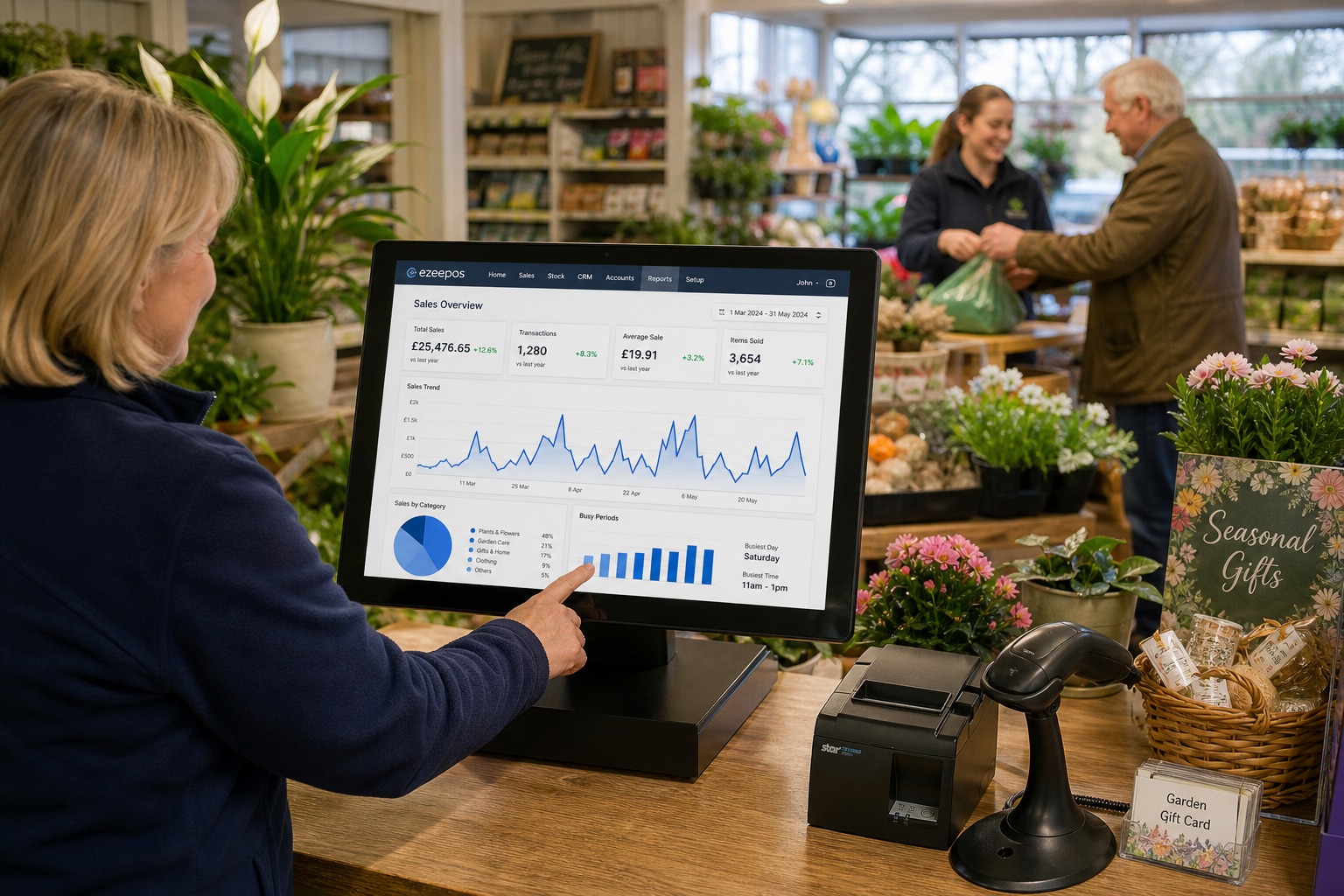 How EPOS Reporting Helps Seasonal Retail Businesses Plan Ahead, photorealistic commercial photography of a UK seasonal retail business inside a bright modern garden centre shop counter, a business owner reviewing sales reporting charts on an ezeepos-style POS touchscreen terminal with subtle blue interface accents, nearby seasonal products such as plants, gifts and retail displays, clean counter area, realistic barcode scanner and receipt printer visible but not dominant, warm natural daylight, shallow depth of field, premium professional composition, friendly staff member in the background serving a customer, the POS screen clearly showing simple sales trend charts and busy-period analytics, realistic UK retail environment, custom blog hero image, not staged, not futuristic, not crowded, designed to illustrate planning ahead with EPOS reporting for seasonal retail businesses
