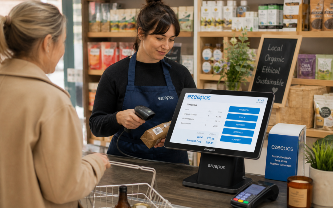 Barcode Scanning for Faster Retail Checkouts, photorealistic commercial photography style of a UK independent retail shop counter during a busy but calm trading moment, a friendly staff member using a modern ezeepos-style touchscreen POS terminal while scanning a product barcode with a handheld scanner, a customer waiting at the counter with a small basket, clear barcode labels and a neat checkout area visible, subtle blue brand accents on the screen interface and small signage, realistic product shelves in soft focus behind the counter, warm natural lighting, shallow depth of field, premium but authentic composition, professional UK retail environment, the POS technology is the clear focus of the image and the scene should feel like a custom featured image for a blog article about faster retail checkouts and reduced mistakes