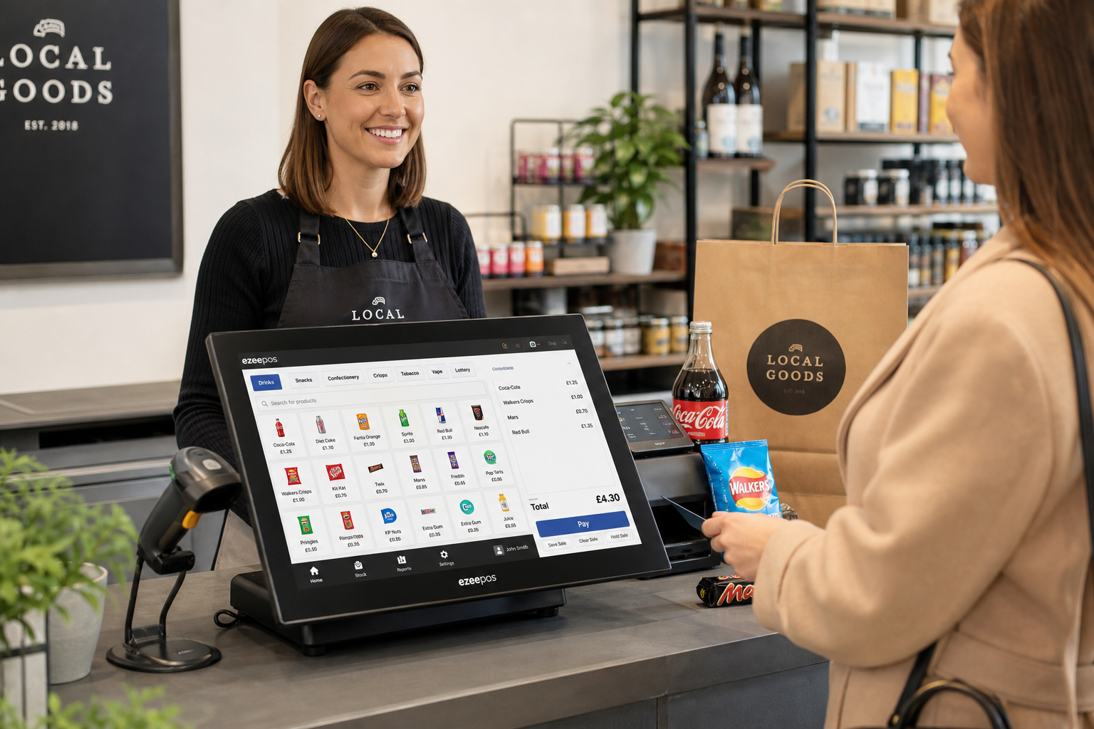 Touchscreen Tills for Retail Shops: What to Consider Before You Upgrade, a photorealistic commercial photography style image in a modern UK independent retail shop with a clean checkout counter, a friendly shop assistant serving a customer using a sleek ezeepos-style touchscreen POS terminal, clear product buttons and a tidy interface with subtle blue brand accents, a barcode scanner and shopping items nearby, warm natural lighting, shallow depth of field, premium but realistic composition, professional website blog hero image feel, technology as the focus, realistic counter details, welcoming atmosphere, suitable for a WordPress featured image.